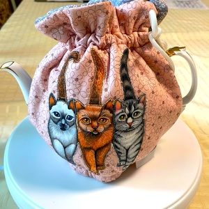 Handcrafted one of a kind tea Cosy . 100% quality cotton. Reversible medium size